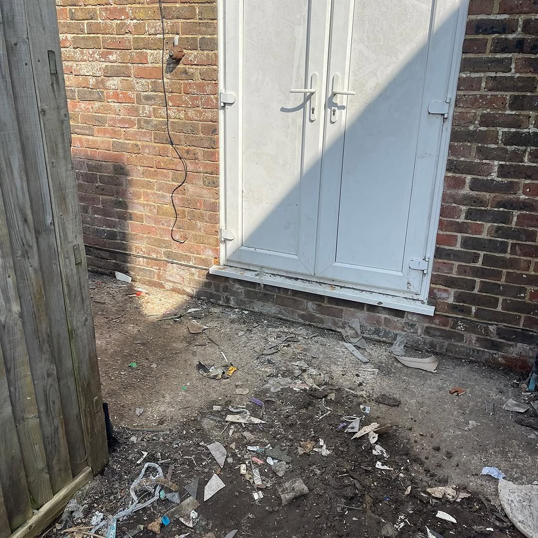 Cleared area near a property after house clearance in Sussex